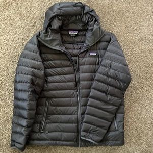 Like new Patagonia goose down hooded jacket with polyester lining.